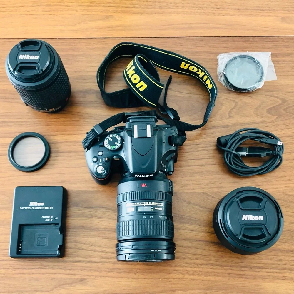 Nikon D5100 Body with 3 Lenses + More